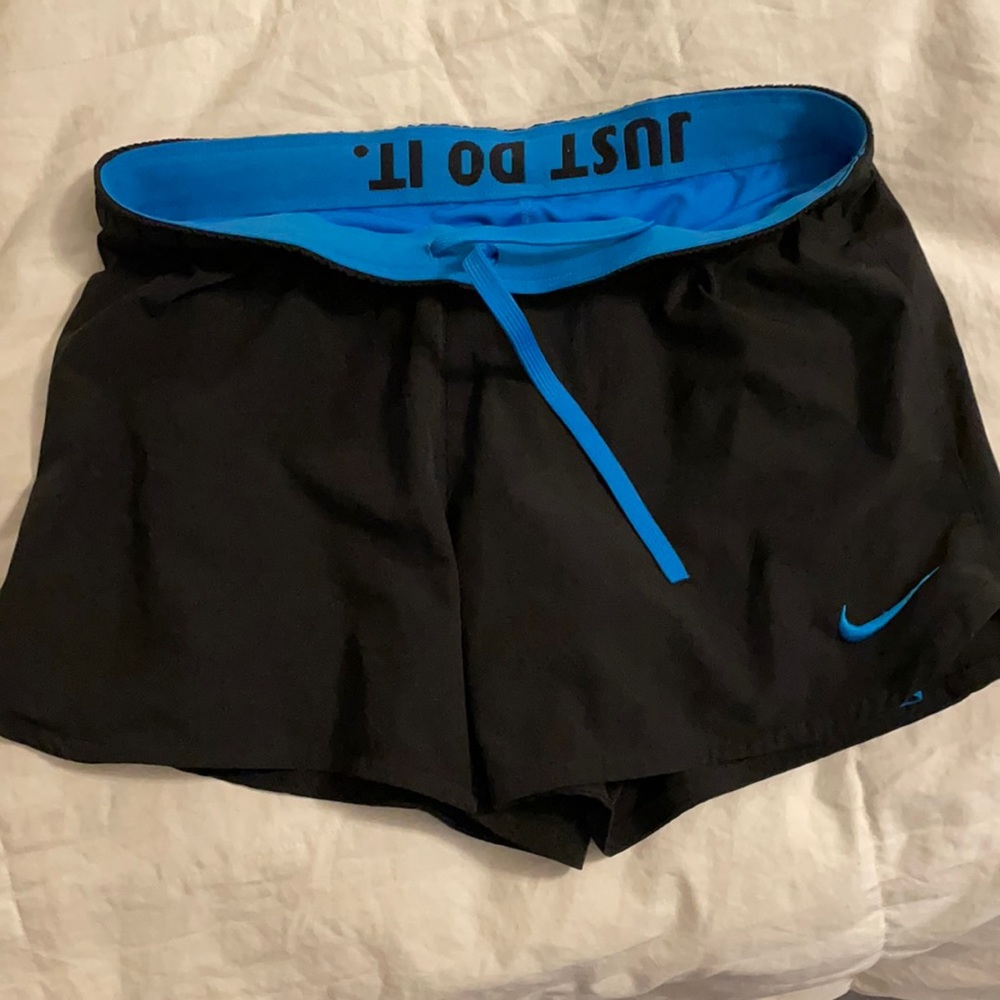 Black Nike shorts with blue lining spandex!